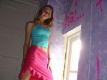 A blond lady posing